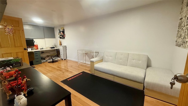 154-6 64th Ave, Flushing, NY 11367 - living area with light wood finished floors and an office area