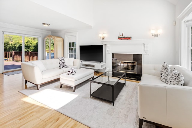 5 Ponds Rd, Water Mill, NY 11976 - living room featuring wood finished floors and a fireplace with flush hearth