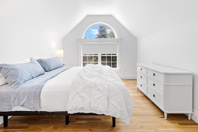 5 Ponds Rd, Water Mill, NY 11976 - bedroom with lofted ceiling, light wood-type flooring, and multiple windows
