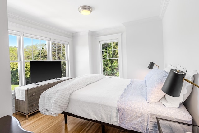 5 Ponds Rd, Water Mill, NY 11976 - bedroom with wood finished floors and crown molding
