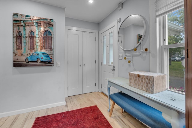 3 Makamah Beach Rd, Northport, NY 11768 - entryway with wood finished floors and baseboards