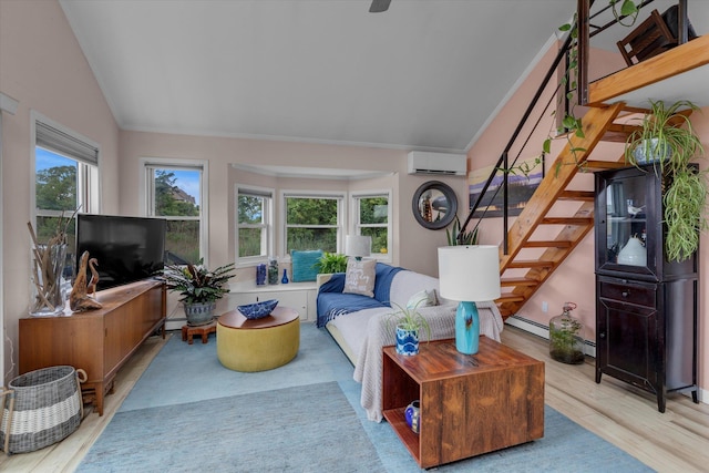 3 Makamah Beach Rd, Northport, NY 11768 - living room with vaulted ceiling, a wall unit AC, wood finished floors, stairway, and a baseboard heating unit
