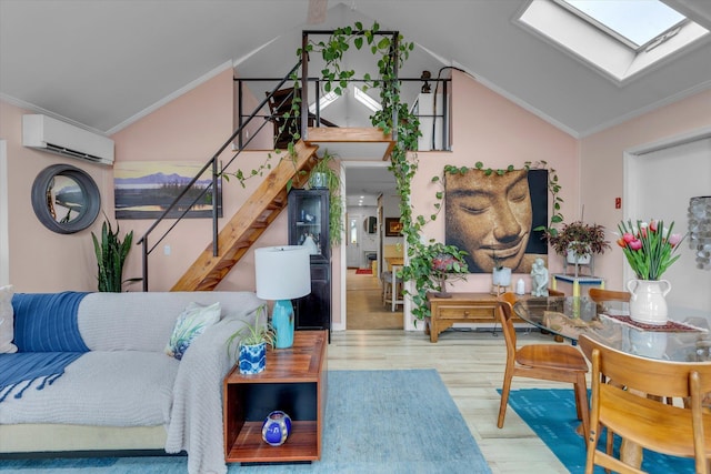3 Makamah Beach Rd, Northport, NY 11768 - living area featuring a wall mounted AC, a skylight, vaulted ceiling, wood finished floors, and ornamental molding