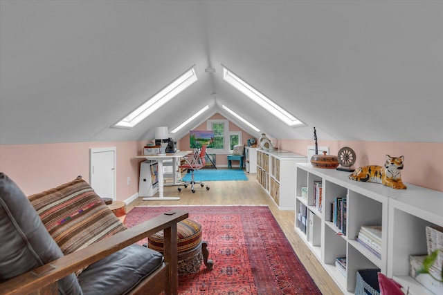 3 Makamah Beach Rd, Northport, NY 11768 - office space featuring a skylight, wood finished floors, and vaulted ceiling