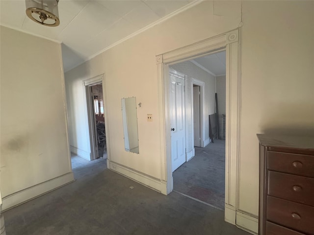 25 E Broome St, Port Jervis, NY 12771 - hallway with crown molding, baseboards, and dark carpet