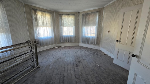 25 E Broome St, Port Jervis, NY 12771 - spare room featuring crown molding, dark wood-style floors, wallpapered walls, and baseboards