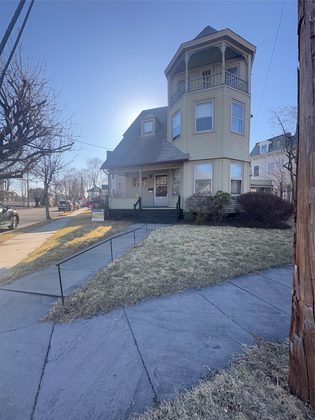 25 E Broome St, Port Jervis, NY 12771 - victorian house with a porch and a balcony