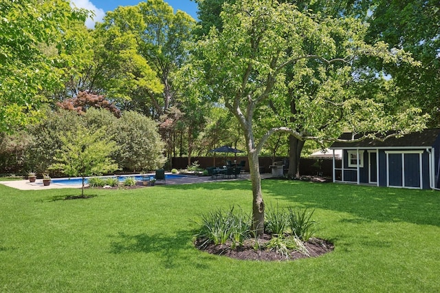 33 Elm St, Lake Ronkonkoma, NY 11779 - view of yard with an outdoor pool, an outbuilding, and a patio area