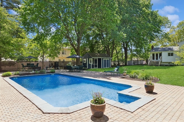 33 Elm St, Lake Ronkonkoma, NY 11779 - view of swimming pool with an outdoor structure, outdoor dining area, entry steps, and a patio area