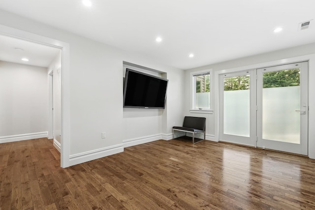 1 Berkley Ct, Briarcliff Manor, NY 10510 - unfurnished living room with dark wood finished floors, recessed lighting, and baseboards