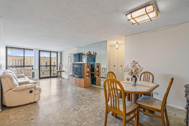 152-18 Union Tpke Unit 4G, Flushing, NY 11367 - dining room with a textured ceiling and floor to ceiling windows