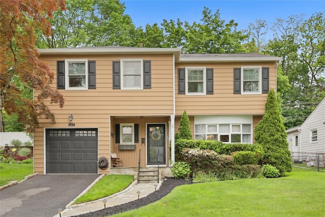243 Albemarle Rd, White Plains, NY 10605 - townhome / multi-family property with an attached garage and asphalt driveway