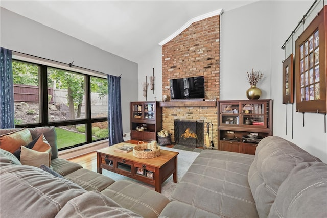 243 Albemarle Rd, White Plains, NY 10605 - living room featuring vaulted ceiling and a fireplace