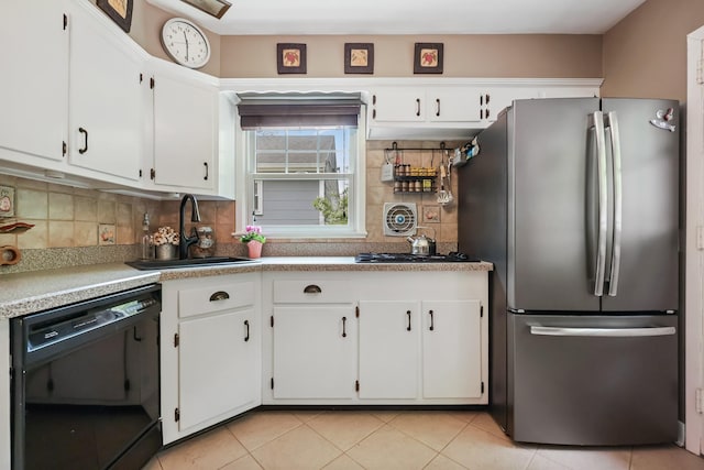 243 Albemarle Rd, White Plains, NY 10605 - kitchen featuring appliances with stainless steel finishes, a sink, and white cabinets