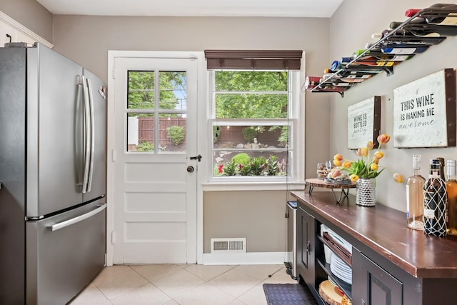 243 Albemarle Rd, White Plains, NY 10605 - doorway to outside featuring light tile patterned floors and baseboards