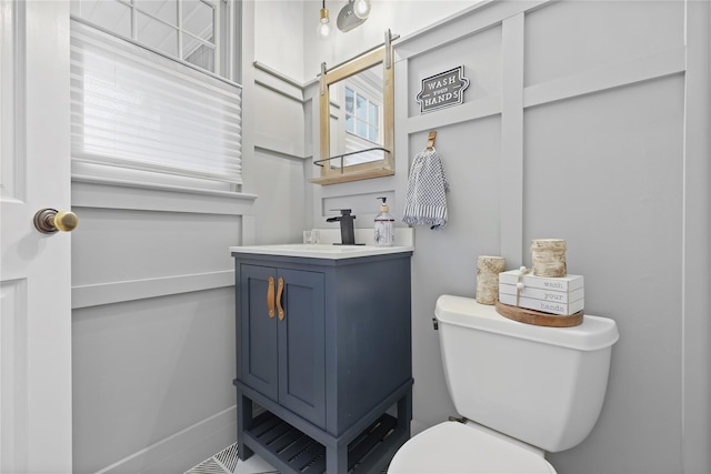 243 Albemarle Rd, White Plains, NY 10605 - bathroom featuring toilet, vanity, and baseboards