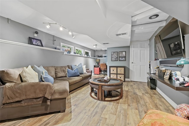 243 Albemarle Rd, White Plains, NY 10605 - living area with track lighting and light wood-style flooring