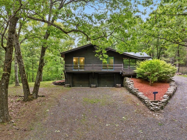 100 Schnackenberg Rd, Call Listing Agent, NY 12075 - view of side of property with a deck, driveway, and an attached garage