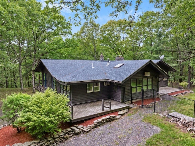 100 Schnackenberg Rd, Call Listing Agent, NY 12075 - rear view of house featuring a shingled roof, a chimney, and a wooden deck