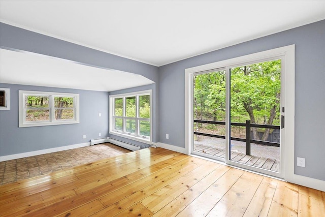 100 Schnackenberg Rd, Call Listing Agent, NY 12075 - empty room with a baseboard heating unit, baseboards, and hardwood / wood-style flooring