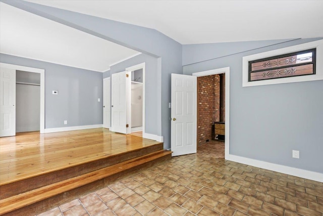100 Schnackenberg Rd, Call Listing Agent, NY 12075 - unfurnished bedroom with vaulted ceiling, baseboards, and ensuite bath