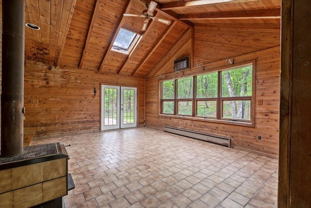 100 Schnackenberg Rd, Call Listing Agent, NY 12075 - unfurnished living room featuring wood walls, a baseboard heating unit, wooden ceiling with exposed beams, a skylight, and ceiling fan