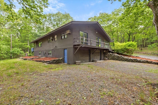 100 Schnackenberg Rd, Call Listing Agent, NY 12075 - view of side of property featuring a garage, driveway, and a wooden deck
