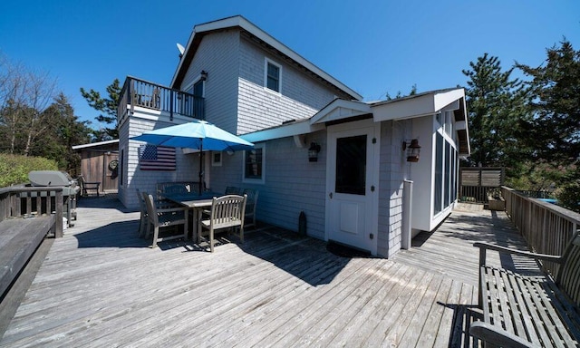31 Gull Walk, Dunewood, NY 11706 - wooden deck featuring outdoor dining space