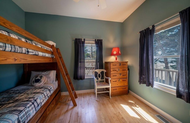 31 Gull Walk, Dunewood, NY 11706 - bedroom featuring hardwood / wood-style flooring, baseboards, vaulted ceiling, and a ceiling fan