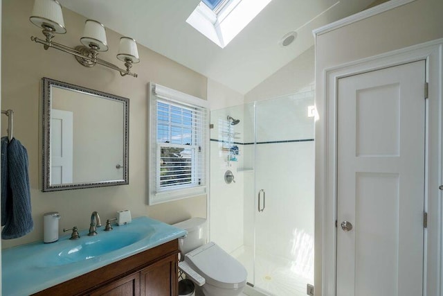 31 Gull Walk, Dunewood, NY 11706 - bathroom featuring a skylight, a shower stall, vaulted ceiling, vanity, and toilet