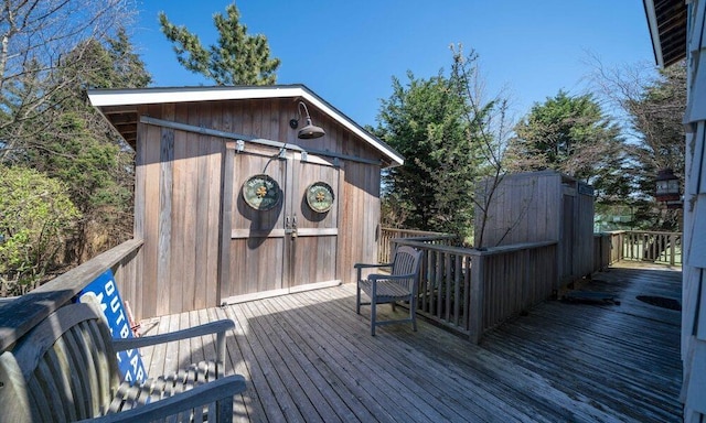 31 Gull Walk, Dunewood, NY 11706 - wooden terrace featuring an outbuilding