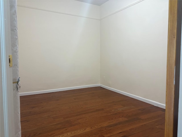 262 Grant Ave, Brooklyn, NY 11208 - unfurnished room featuring dark wood-style flooring and baseboards