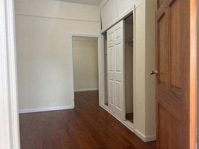 262 Grant Ave, Brooklyn, NY 11208 - corridor featuring dark wood finished floors and baseboards
