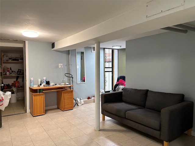 262 Grant Ave, Brooklyn, NY 11208 - living room featuring light tile patterned floors and an office area