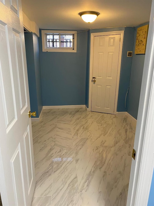 154-02 119th Ave, Jamaica, NY 11434 - empty room featuring baseboards and light marble finish flooring