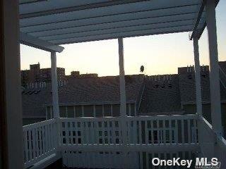 205 Aquatic Pl, Arverne, NY 11692 - view of property at dusk