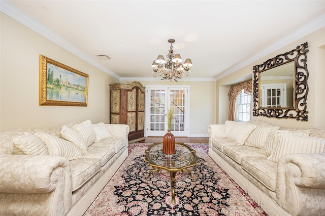 30 Knoll Ln, Glen Head, NY 11545 - living room featuring crown molding, a chandelier, wood finished floors, and baseboards