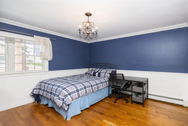 30 Knoll Ln, Glen Head, NY 11545 - bedroom with a chandelier, wood finished floors, ornamental molding, a baseboard radiator, and baseboards