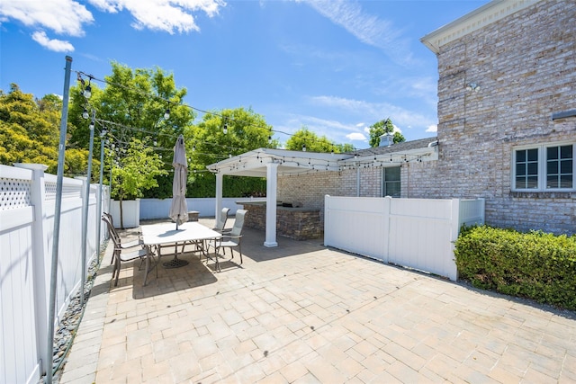 30 Knoll Ln, Glen Head, NY 11545 - fenced backyard with a patio area and outdoor dining space