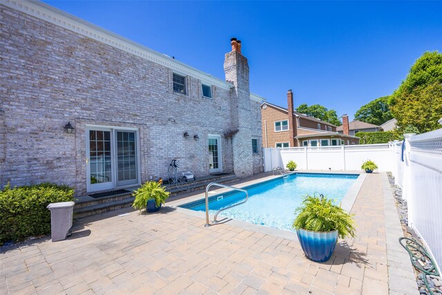 30 Knoll Ln, Glen Head, NY 11545 - view of pool featuring a patio area and a fenced backyard
