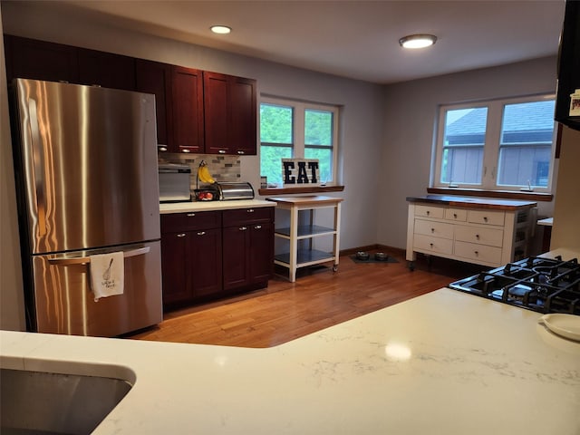 182 Ledge Rd, Kingston, NY 12401 - kitchen featuring freestanding refrigerator, light countertops, light wood-style flooring, stovetop, and recessed lighting