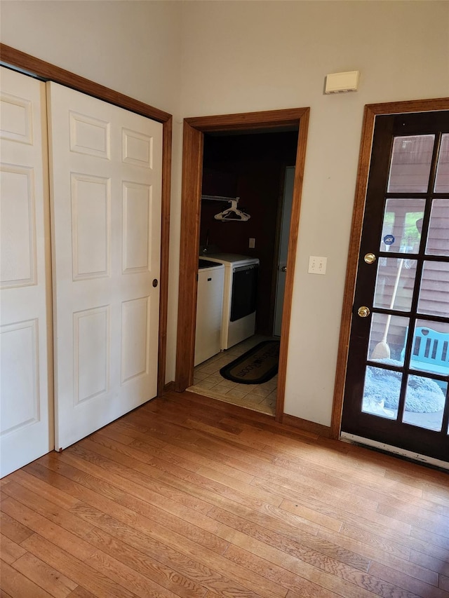 182 Ledge Rd, Kingston, NY 12401 - hallway featuring washer and clothes dryer and light wood-style flooring