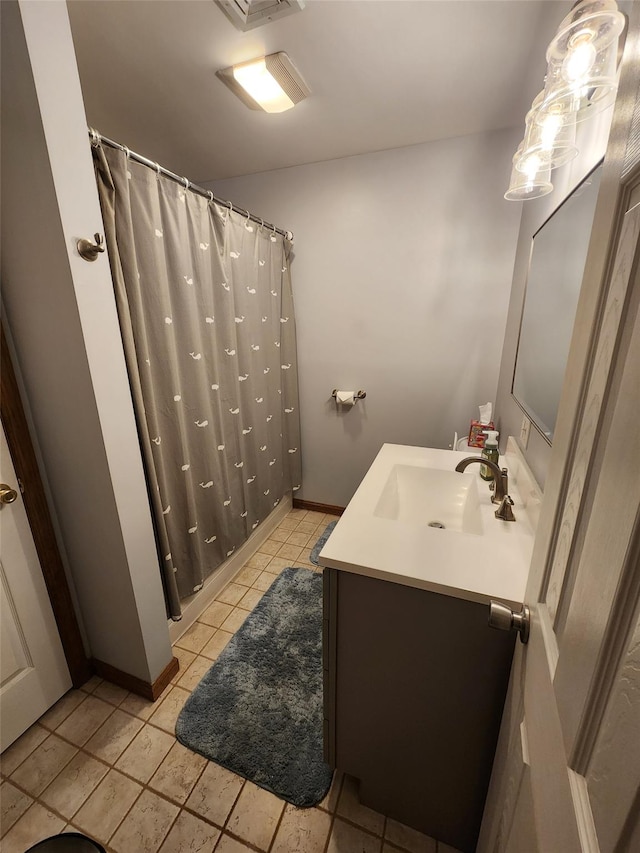 182 Ledge Rd, Kingston, NY 12401 - bathroom featuring vanity, tile patterned flooring, baseboards, and curtained shower