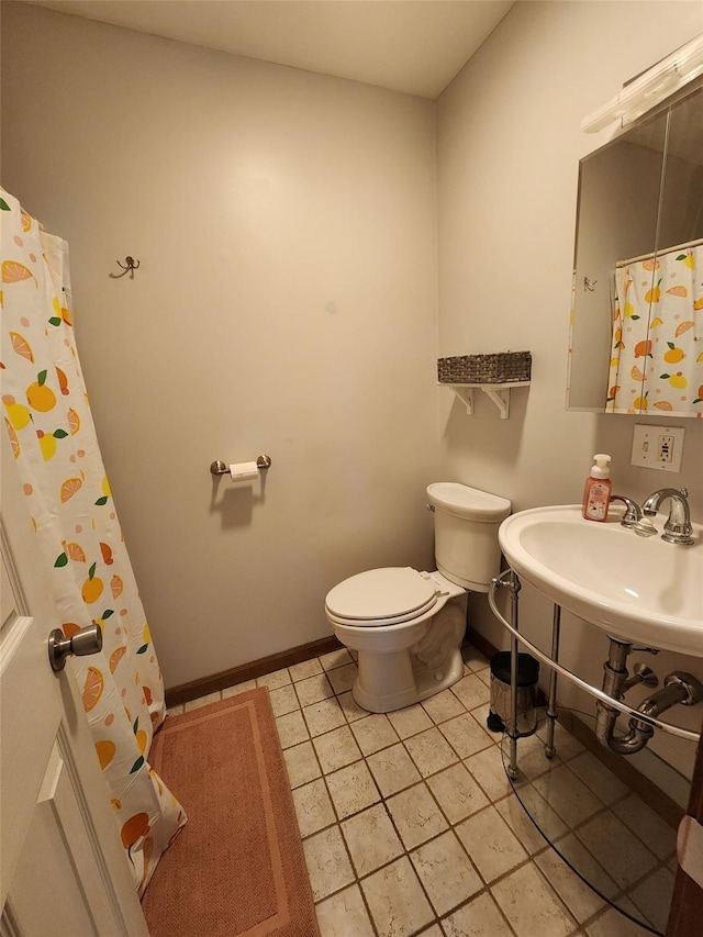 182 Ledge Rd, Kingston, NY 12401 - bathroom featuring toilet, tile patterned floors, a sink, and baseboards