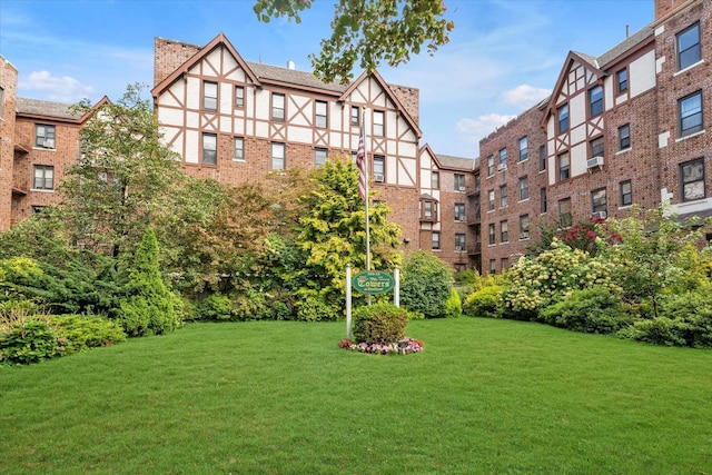 160-15 Powells Cove Blvd Unit D203, Beechhurst, NY 11357 - view of property's community with a yard