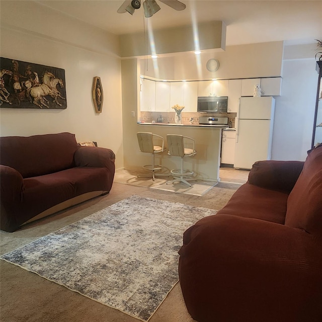 160-15 Powells Cove Blvd Unit D203, Beechhurst, NY 11357 - living area with a ceiling fan
