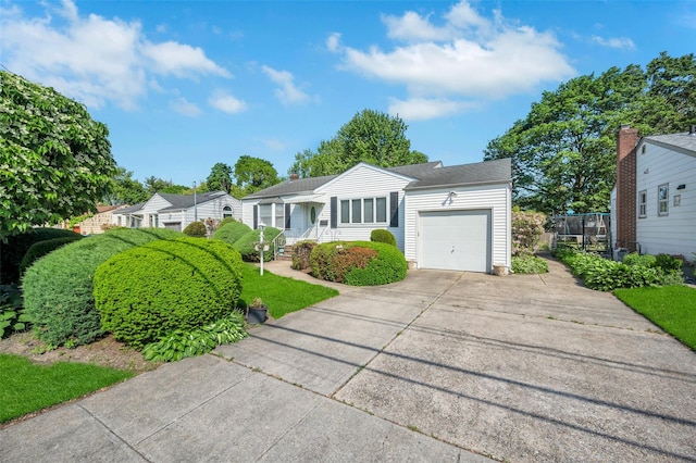 383 Old Country Rd, Deer Park, NY 11729 - ranch-style home featuring an attached garage and concrete driveway