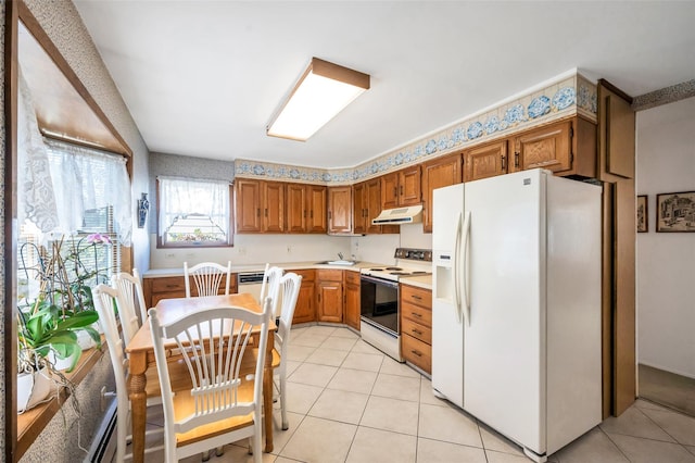 383 Old Country Rd, Deer Park, NY 11729 - kitchen with white appliances, under cabinet range hood, brown cabinetry, and light tile patterned flooring