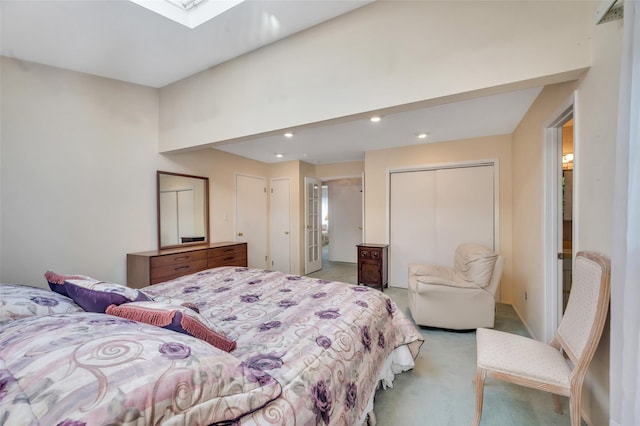 383 Old Country Rd, Deer Park, NY 11729 - bedroom featuring light carpet, a closet, a skylight, and recessed lighting