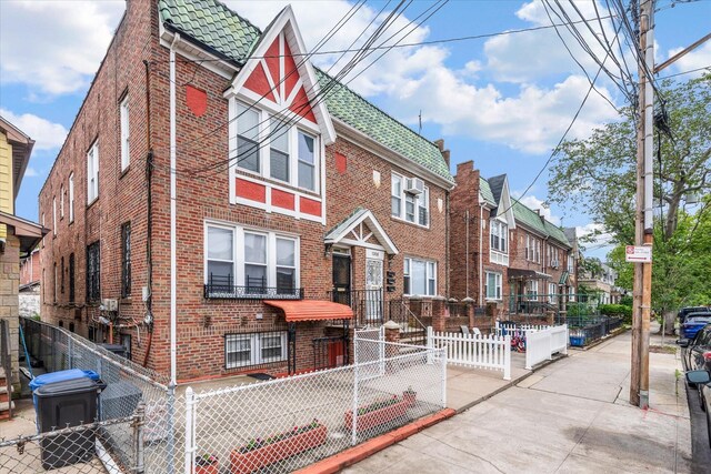1358 E 35th St, Brooklyn, NY 11210 - view of front of house featuring brick siding and a residential view
